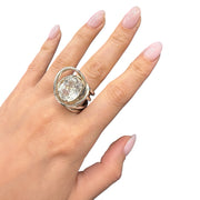 silver ring with topaz